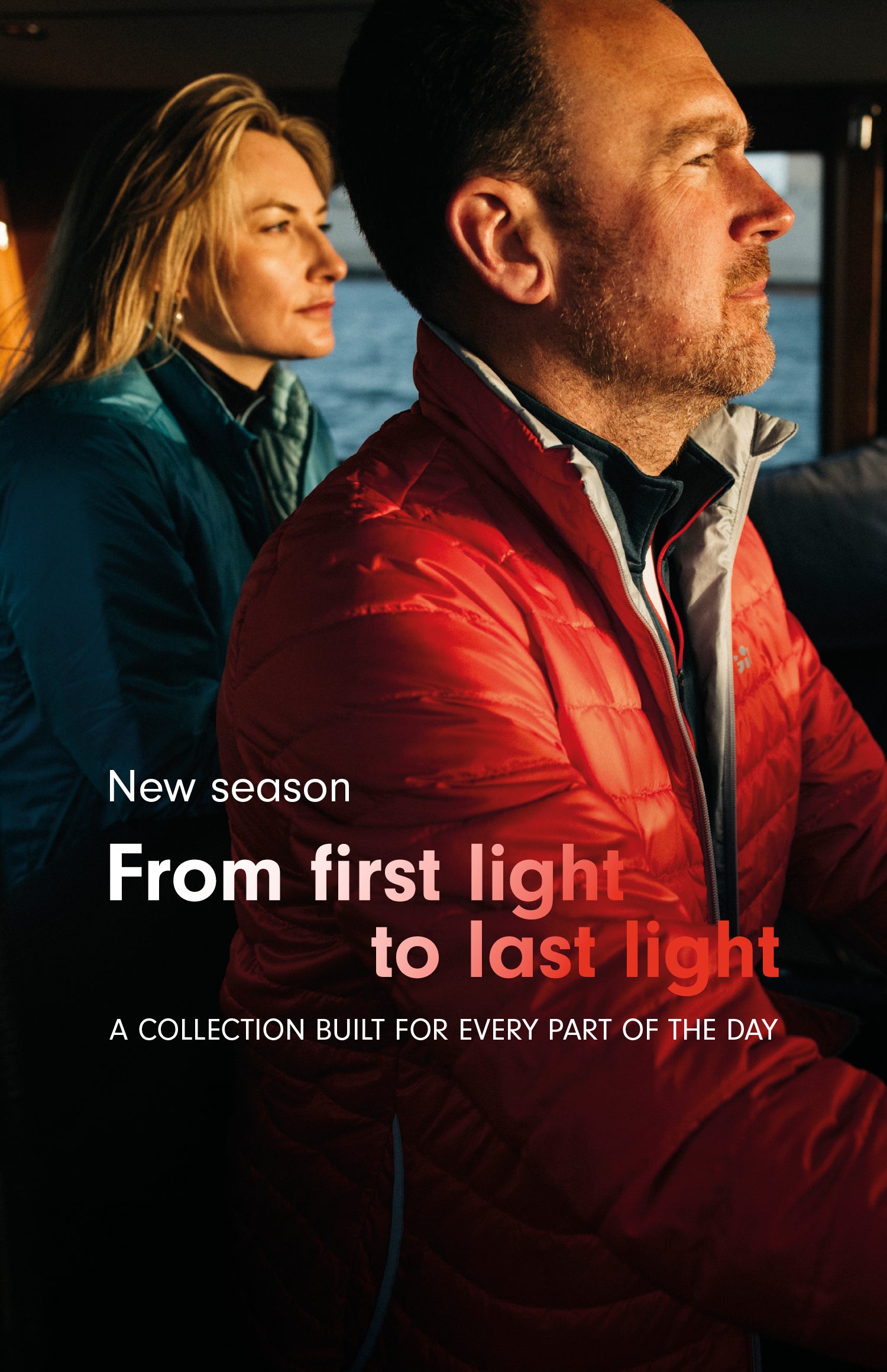 A promotional lifestyle image for an outdoor apparel collection, featuring a man in a red puffer jacket in the foreground and a woman in a teal jacket in the background. Text overlays read 'New season From first light to last light A COLLECTION BUILT FOR EVERY PART OF THE DAY'.